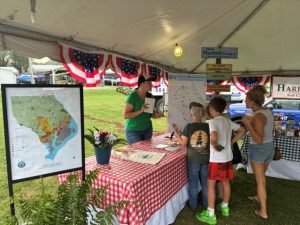 Photo of farm fair table setup.